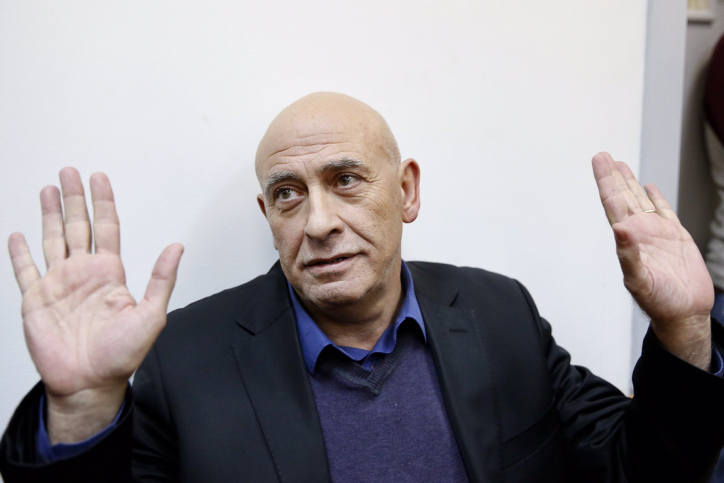Joint Arab List member Basel Ghattas is braught to court for a remand on his arrest at the Rishon Lezion Magistrate's Court, December 26, 2016. Ghattas is suspected of smuggling cell phones to Palestinian security prisoners. Photo by Meged Guzani/POOL *** Local Caption *** ?????? ??????? 
???? ????
??? ????
??? 433
?????