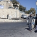 Palestinians walk next to an Israeli police guard post between the East Jerusalem neighbourhood of Jabal Mukaber and the Jewish neighborhood of Armon Hanatziv , October 21, 2015, on Sunday Police started setting up a concrete wall between Jabel Mukaber, an Arab neighborhood, and Armon Hanatziv, a Jewish neighborhood. the walls is part of the police effort to stop the Molotov cocktails that being thrown at Jewish homes. Photo by Lior Mizrahi/Flash90 *** Local Caption *** ???? ?????
?????
???? ???????
?????
????? ?????
????
?????????
???
?'?? ??????