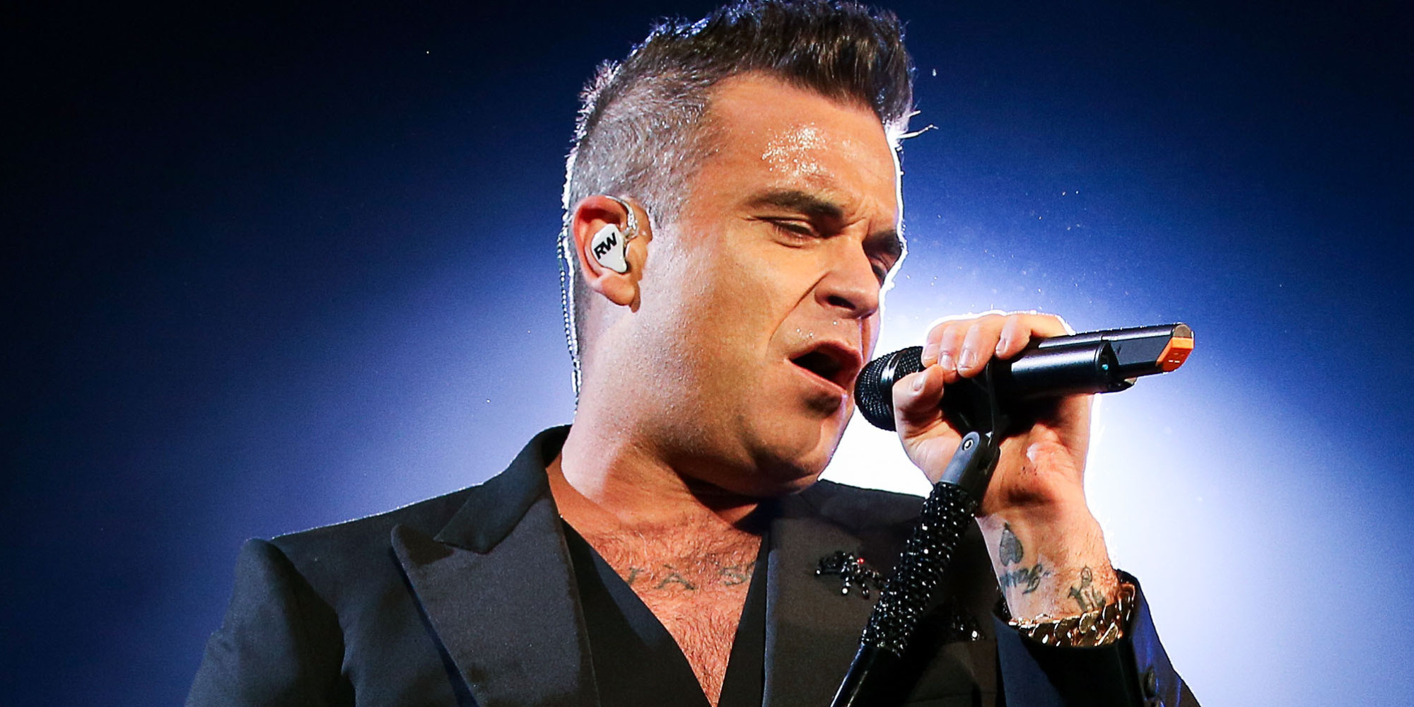 WELLINGTON, NEW ZEALAND - OCTOBER 31:  Robbie Williams performs live during his 'Let Me Entertain You' tour at Basin Reserve on October 31, 2015 in Wellington, New Zealand.  (Photo by Hagen Hopkins/Getty Images)