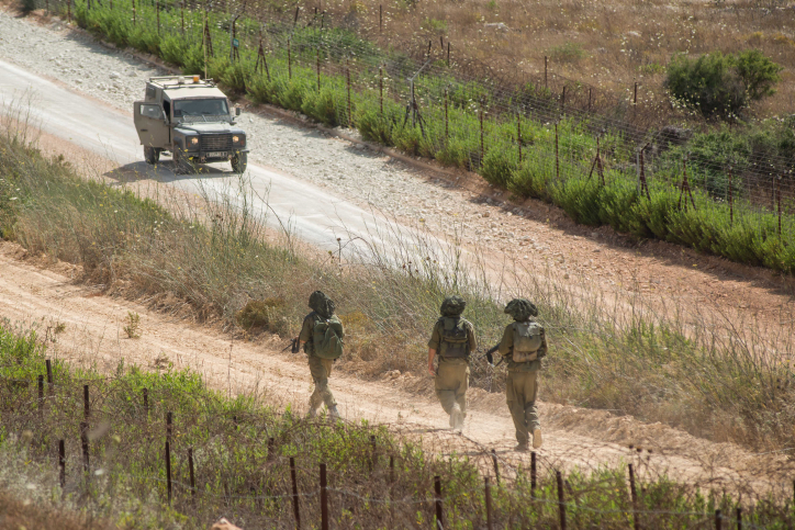 Israeli army jeeps patrol along the Northern Israeli border with Lebanon on July 14, 2014. Code Red siren, warning of incoming rocket, was heard earlier this evening when a  rocket fired from Syria, hit the Golan Heights, Northern Israel. The rocket hit an open area in the Golan Heights. Photo by Ayal Margolin/FLASH90


 *** Local Caption *** ???? ??? ?? ???? ????? 
??????
????