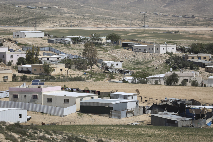 A view of the Beduin village dispersion in the Negev, showing the different homes from small makeshift shacks to large villas, on Tuesday, April 1, 2014. Beduins living in villages unrecognized by the State of Israel, often get their water sources from crates of water which they privately buy from a distributer. Photo by Hadas Parush/Flash 90. *** Local Caption *** ????
???
??????
??????
??????
????
??????
?????