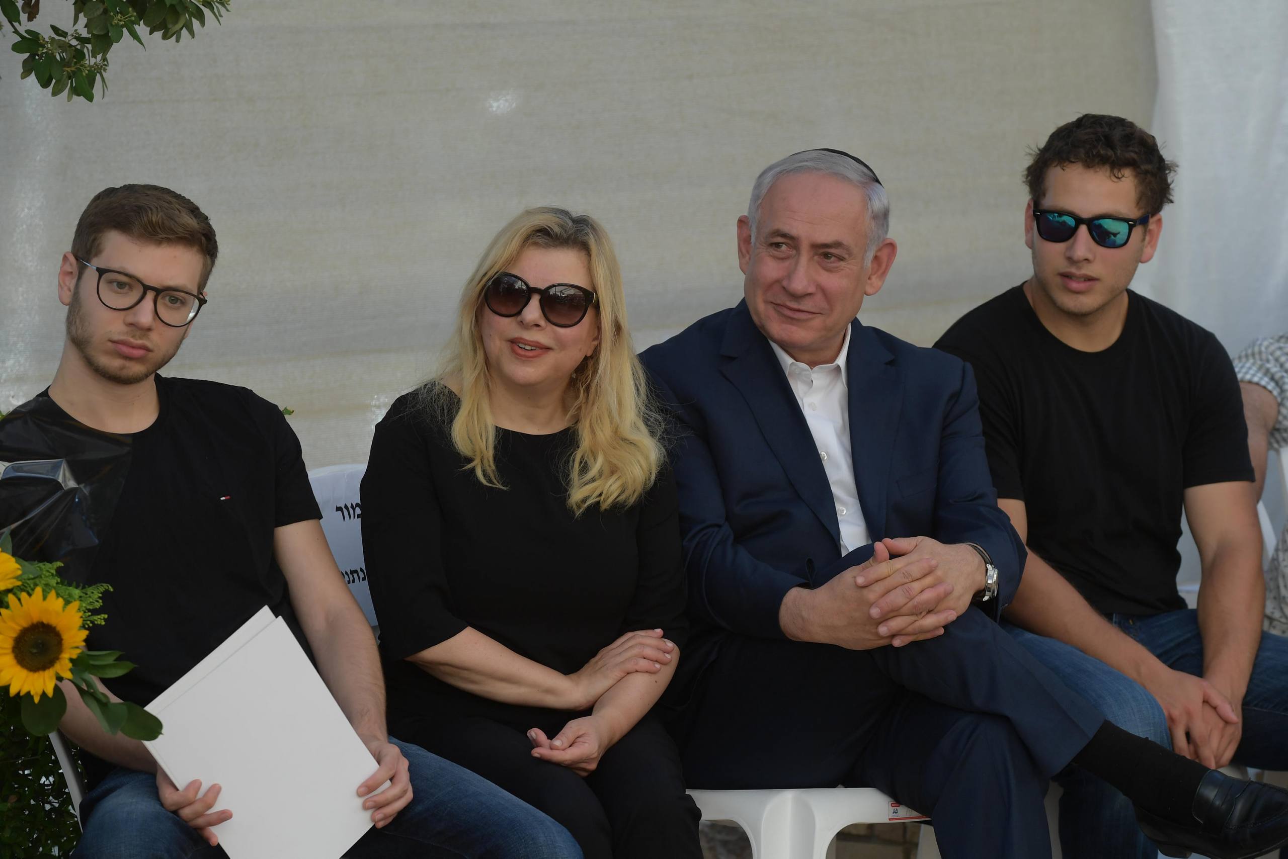 Prime Minister Benjamin Netanyahu his wife Sara, their sons Yair and Avner, attend a memorial ceremony for Netanyahu's brother, Yoni Netanyahu, at the Mount Herzl Military Cemetery, in Jerusalem, July 9, 2017. Yoni Netanyahu was killed in the operation to free soldiers kidnapped in Antebe. Photo by Amos Ben Gershom/GPO *** Local Caption *** ????? ?????? ??? ????
?????  ???? ?????? ????? ???? ?????
??? ?????? ????? ??????? ???, ????? ???? ??????