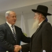 Israeli Prime Minister Benjamin Netanyahu (L) congrtulates incoming Deputy Health Minister Yaakov Litzman at a welcoming ceremony for Litzman, at the Health Ministry in Jerusalem on May 20, 2015. photo by Amos Ben gershom/GPO *** Local Caption *** ??? ?????? ?????? ?????? ???? ????? ???? ????? ???????
