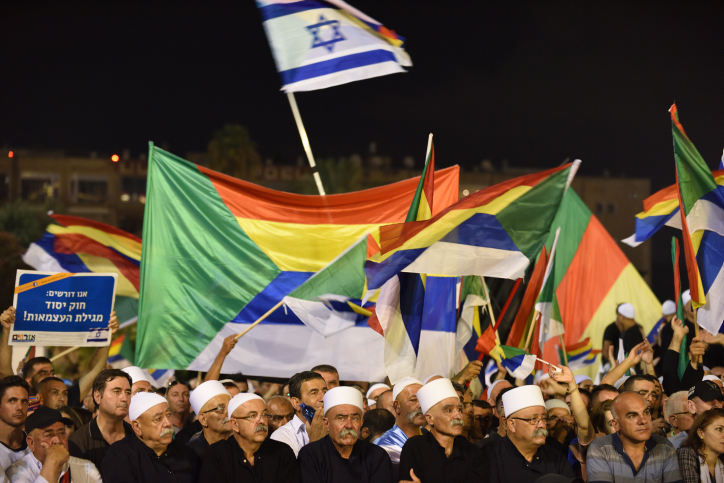 Israeli Druze attentd a Druze-led rally to protest against the 'Jewish Nation-State law' in Rabin Square, Tel Aviv on Aug. 04, 2018. Tens of thousands of Israeli Druze and their supporters gathered in Tel Aviv on Saturday night to protest against the 'Jewish Nation-State' law. Photo by Gili Yaari /FLASH90 *** Local Caption *** ?????
????? ??? ??? ?????
???? ???????
?????? ??????
???? ????