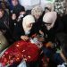 Relatives react next to the body of a Palestinian who allegedly carried out attacks against Israelis, after his body was released by Israel, during his funeral in Silwad near the West Bank city of Ramallah January 3, 2016. Photo by Flash90
 *** Local Caption *** ?????
??????
????????
????
?????????
??
????
???????
????
????
????
?????
????????
?????