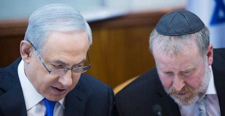 Israeli Prime Minister Benjamin Netanyahu (L) speaks with Cabinet secretary Avichai Mandelblit during the weekly government conference, at Prime Minister's Office in Jerusalem, on December 20, 2015. Photo by Yonatan Sindel/Flash90 *** Local Caption *** ????? ?????
??? ?????? ?????? ??????
????
???? ??? ??????
????? ????????