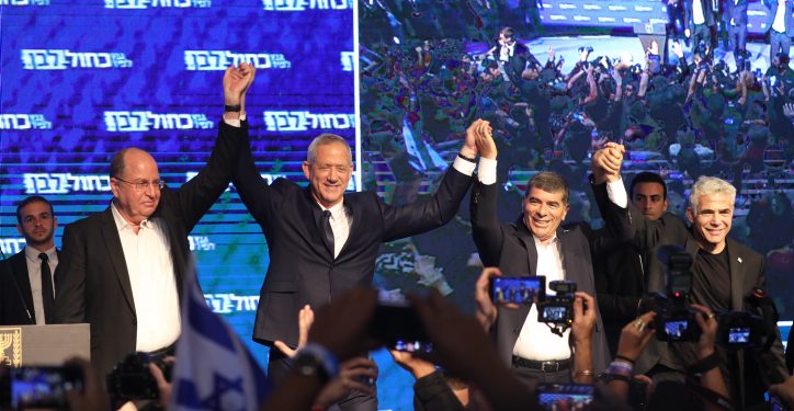 Head of the Blue White political party Benny Gantz (2L), Boogie Yaalon, Gabi Ashkenazi and Yair Lapid greet their party supporters as the results in the Israeli general elections are announced,  at the party headquarters in Tel Aviv, on April 09, 2019. Photo by Noam Revkin Fenton/FLASH90 *** Local Caption *** ??????
??? ???
???? ???
??????
???? ?????
???? ????