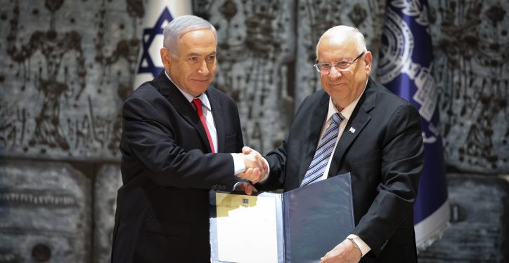 Israel's President Reuven Rivlin shake hands with Prime Minister Benjamin Netanyahu as Rivlin task Benjamin Netanyahu with forming the next coalition,  at the president's residence in Jerusalem on April 17, 2019. Photo by Noam Revkin Fenton/Flash90 *** Local Caption *** ???????
??? ?????
??? ?????
?????? ??????
??? ??????
????? ??????
???? ??????
????????
?????