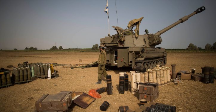 Israeli Artillery Corps soldiers seen in a field near the border with Gaza in South Israel, on the fifth day of Operation Protective Edge, July 12, 2014. Photo by Yonatan Sindel/Flash90 *** Local Caption *** ???? ??? ????
??????
???????
???
????
???????
??????