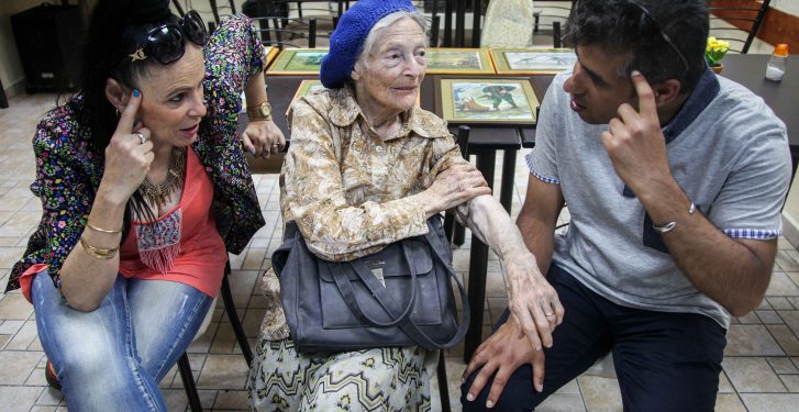 **FILE** A Holocaust survivor meets with Iranian Bristish students of the Church of Light at the Yad Ezer La Haver Association in Haifa, on June 4, 2013. British students of the Church of Light who were born in Iran and some were raised as Muslims, met with Holocaust survivors in Israel and for the first time in their lives heard survivors tell their story. Photo by Avishag Shaar Yashuv/Flash90**FILE**
ch2newsout *** Local Caption *** ?????? ? ???? ?????? ? ???? ? ??????? 
???? ?????? ????
?????
????
?????
??????
???????
?????? ????
?? ??? ????
?????
??????
???????
?????
?????
???????
????
??????
?????
???????
?????? ??????