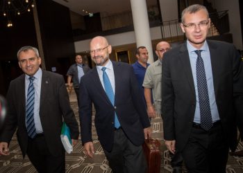 Minister of Jerusalem Affairs Zeev Elkin and Israeli Minister of Tourism Yariv Levin of the Likud party walk with Yoram Turbovich of the Blue and White party as they arrive for a meeting in an attempt to form a coalition, in Jerusalem, September 27, 2019. Photo by Yonatan Sindel/Flash90
 *** Local Caption *** ??????
????
?????
???? ???
???? ????
??? ?????
???? ????????