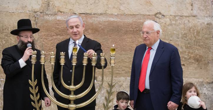 Israeli Prime Minister Benjamin Netanyahu lights the 'Chanuckia' on the First night of the Jewish holiday of Hanukkah at the Western Wall in Jerusalem Old City on December 22, 2019, together with Israeli soldiers and US ambassador to Israel, David Friedman. Photo by Noam Revkin Fenton/Flash90 *** Local Caption *** ??? ?????? ?????? ??????
????
????? ????
????
????? ????
????? ??????