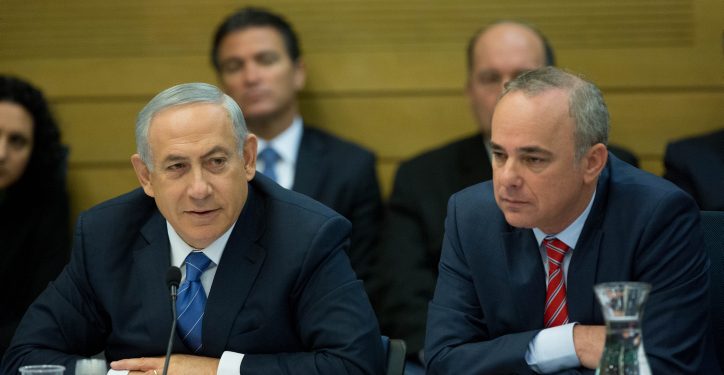 Israel Prime Minister Benjamin Netanyahu (L) seen with Minister of National Infrastructure, Energy and Water Resources, Yuval Steinitz in a committee meeting at the Israeli parliament during a discussion on a controversial natural gas deal which was recently approved by the Israeli government. December 08, 2015. Photo by Yonatan Sindel/Flash90 *** Local Caption *** ???? ? ?????
????
???????
??
?????? ??????
???? ???
???? ???????
?? ???????