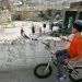 Young Jewish kid sits on his bicycle and looks on in the street of the Jewish neighborhood in the Old City of the West Bank city of Hebron on Monday, Apr 20, 2009. Photo by Kobi Gideon / FLASH90. *** Local Caption *** ?????
???? ?????
???
?????
???????
????
????
???????