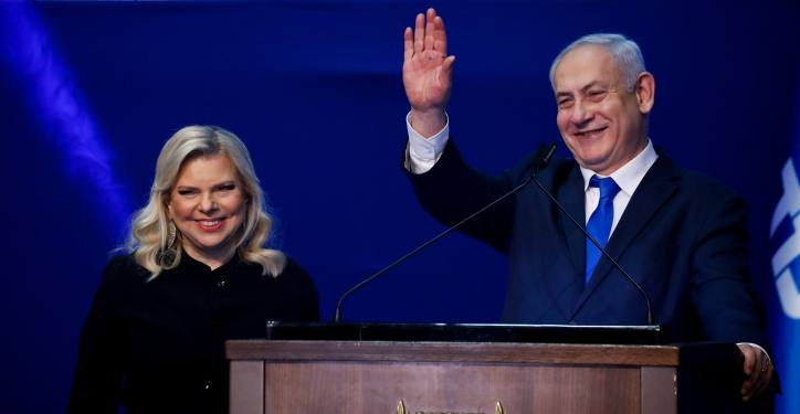 Prime Minister Benjamin Netanyahu and his wife Sara addresses their supporters on the night of the Israeli elections, at the party headquarters in Tel Aviv, on March 3, 2020. Photo by Olivier Fitoussi/Flash90 *** Local Caption *** ?????
??????
????
??? 
??? ?????? ?????? ??????
?????
??????
??????
??? ??????