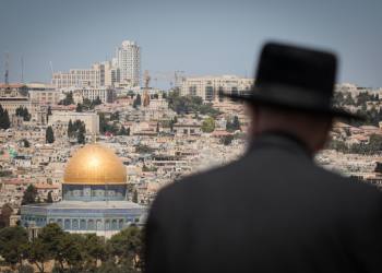 An Ultra Orthodox Jewish man looks at the view of the Dome of the Rock and the Temple Mount from the lookout of the Mount of Olives overlooking the Old city of Jerusalem, on August 11, 2019. Photo by Noam Revkin Fenton/Flash90 *** Local Caption *** ?? ??????
?? ????
??????
??????
???? ???
??? ?????
???????
???????