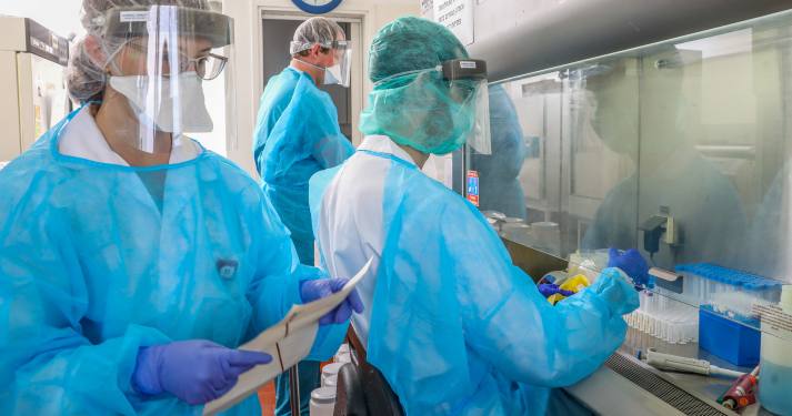 Technicians carry out a diagnostic test for coronavirus in a lab at the Rambam Hospital in Haifa, on March 30, 2020. Photo by Yossi Aloni/Flash90 *** Local Caption *** ?????
??????
?????
??????
??????
???"?
??????
???? ????? 
??????
??? ?????
