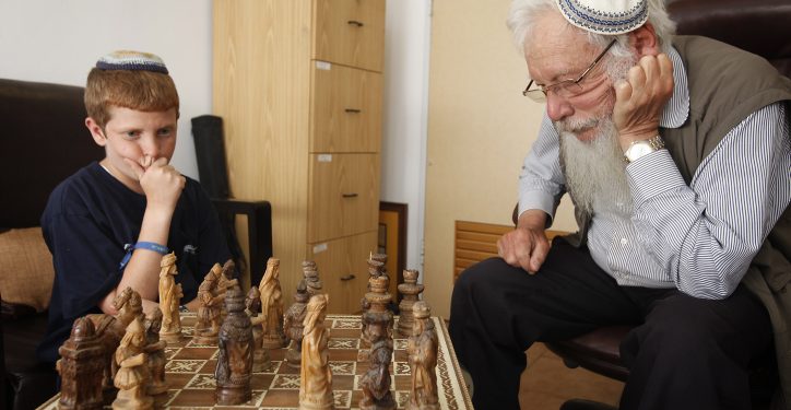 Professor Robert Aumann plays chess with his grandson Shoham, in Aumann's office at the Hebrew University. Aumann recieved the Nobel Prize in economics in 2005. August 31, 2011. Photo by Miriam Alster/FLASh90 *** Local Caption *** ????? ???? 
??????? ????
