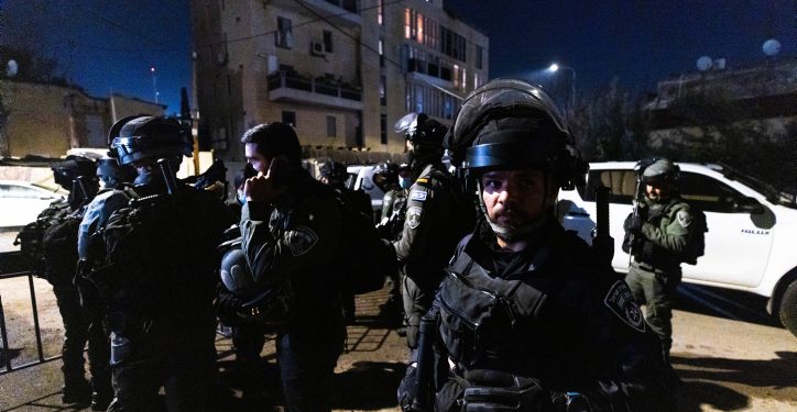 Police guard during clashes between Jewish men and Palestinians in the East Jerusalem neighborhood of Sheikh Jarrah, February 13, 2022. Photo by Olivier Fitoussi/Flash90 *** Local Caption *** ???? ????
???? ???????
???????
????? ???
??????
?????
??????
?????
????? ?? ????
???? ?'???
